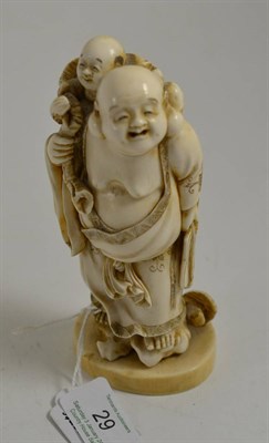 Lot 29 - A 19th century Japanese Meiji period carving of Hotei (loose based), 15cm high