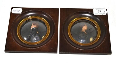 Lot 37 - Pair of Italian wax miniature portraits of a young gentleman and woman, in fruitwood frames...