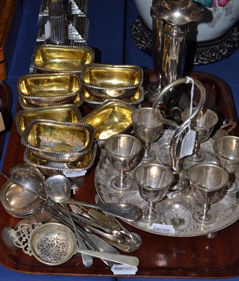 Lot 46 - Ten silver plated and gilt salts engraved with a crest, silver plated egg cups on tray, plated...