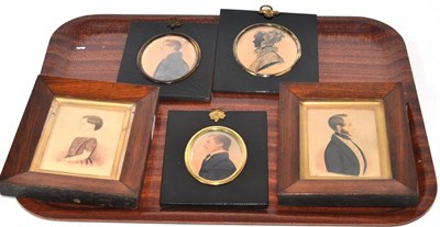 Lot 67 - Two rosewood framed profile portrait miniatures, two similar portraits in papier mache frames and a