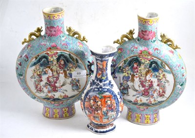 Lot 69 - A pair of Chinese famille rose moon flask vases, height 31cm together with a Chinese polychrome...