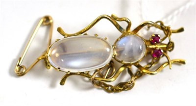 Lot 113 - A ruby and moonstone inset brooch, ruby eyes and two moonstones make up the body, length 3.4cm