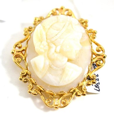 Lot 148 - A 9ct gold opal cameo brooch/pendant, carved as a maiden, with a flower in her hair, in a...