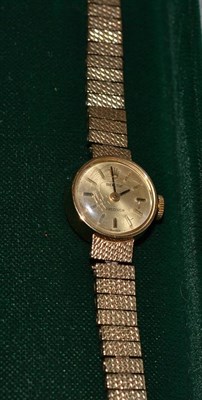 Lot 152 - A lady's 9ct gold wristwatch, signed Rolex, precision, 1967, calibre 1400, lever movement, silvered