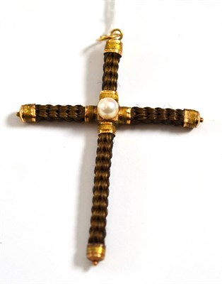 Lot 154 - A mourning pendant, of plaited hair in cross form, with a central pearl, measures 5.4cm by 7.5cm