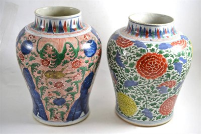 Lot 159 - Two Wucai vases, 29cm and 20cm high (both restored)