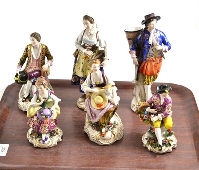 Lot 202 - Pair of Samson of Paris porcelain figures of street vendors, 23cm high; a similar pair of...