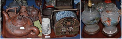 Lot 215 - Three trays of assorted Japanese redware teapots, lacquered food carrier, resin Chinese dog,...