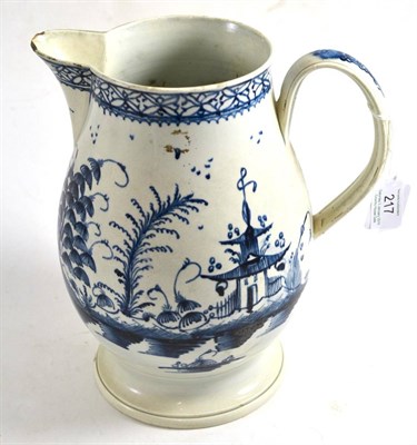 Lot 217 - Pearlware baluster jug, circa 1790, painted in underglaze blue with a chinoiserie landscape,...