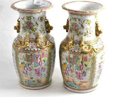 Lot 220 - Pair of late 19th century Chinese canton famille rose pattern vases, 36cm high