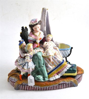 Lot 222 - A 19th century French bisque porcelain figure group as Queen Victorian and three of the Royal...