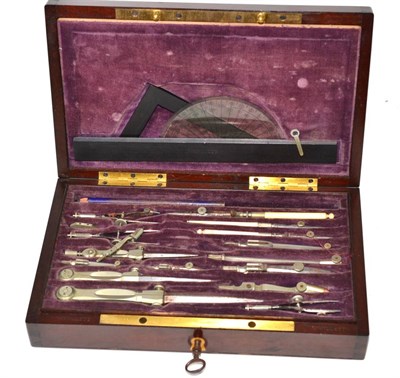 Lot 229 - A 19th century Swiss drawing instrument set in a mahogany hinged box, stamped W Willett