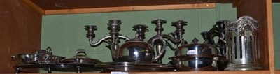 Lot 246 - A shelf of assorted silver plate including large tray, candelabra etc