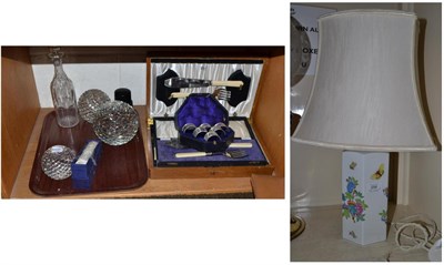 Lot 258 - # A Herend china floral decorated table lamp and shade and a shelf including silver plated fish...