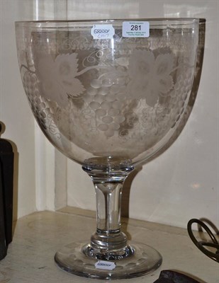 Lot 281 - An engraved glass goblet, 39cm high