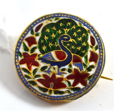 Lot 298 - An Islamic? brooch, the round form enamelled in blue, red, white and green to depict a stylised...