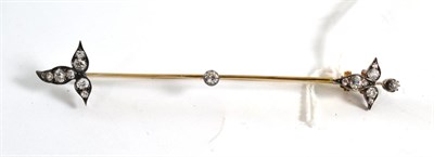 Lot 307 - An old cut diamond bar brooch, a knife edge bar with a fleur-de-lys style diamond set motif at each