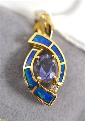 Lot 336 - An opal doublet, diamond and iolite pendant, an oval cut iolite in a yellow claw setting spaced...