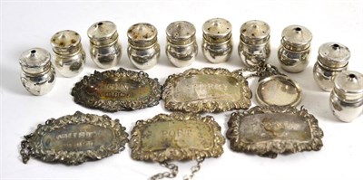 Lot 338 - Ten silver pepperettes, silver medal and five decanter labels 'BRANDY', 'PORT', 'WHISKY', 'GIN' and