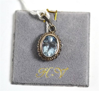 Lot 342 - A 9ct white gold aquamarine pendant, an oval cut aquamarine in a rope twist frame, pendant measures