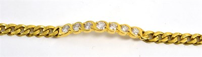 Lot 344 - An 18ct gold diamond bracelet, seven round brilliant cut diamonds in yellow rubbed over...