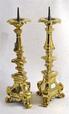 Lot 350 - Pair of Italian brass candlesticks, 46cm high