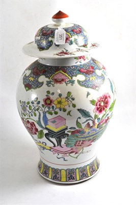 Lot 351 - A large Chinese famille rose porcelain baluster vase and cover painted with precious objects...