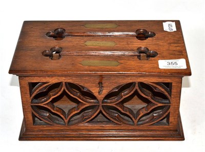 Lot 355 - A 19th century carved oak country house letter box, 25cm wide