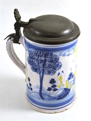 Lot 357 - Pewter mounted faience tankard, 19cm high