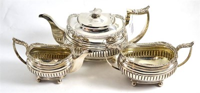 Lot 362 - George III silver three piece tea service