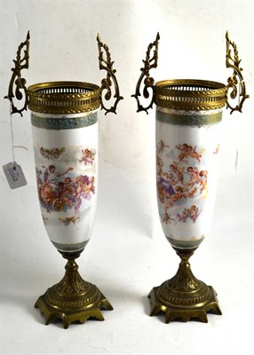 Lot 376 - ^ Pair of late 19th century glass vases decorated with classical figures in chariots, 42cm high