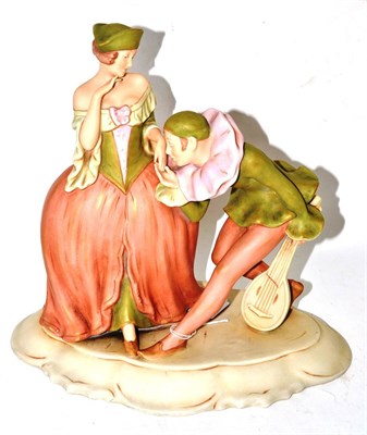 Lot 428 - Royal Dux figure modelled as a lady and a man playing a mandolin, 30cm high