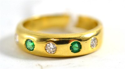 Lot 435 - An 18ct gold emerald and diamond ring, five alternating round cut stones drill set into a plain...