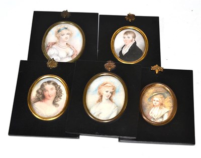 Lot 463 - Four 19th century oval portrait miniatures depicting ladies and a 19th century portrait...