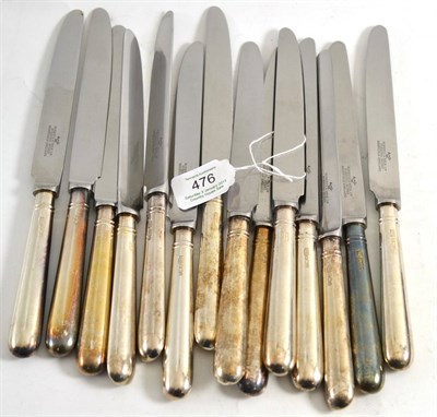 Lot 476 - Fourteen silver handled table knives, Roberts & Belk, Sheffield 1989