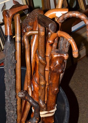 Lot 483 - Two bundles of walking sticks including holly and hardwood examples