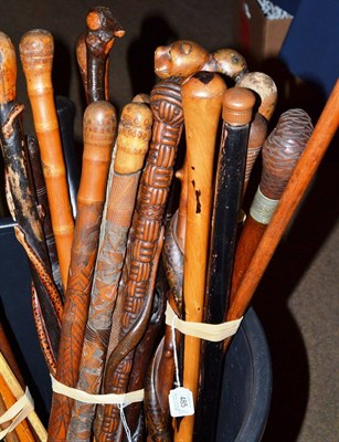 Lot 485 - Two bundles of mainly carved hardwood and African walking sticks