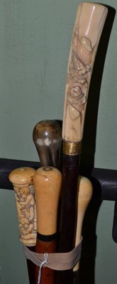 Lot 494 - Late 19th/early 20th century five ivory and bone handled walking sticks