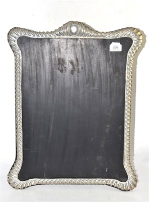 Lot 509 - White metal easel mirror with ebonised mount, 54cm high