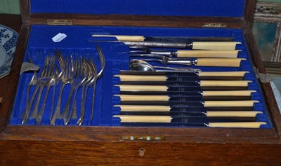 Lot 512 - An oak cased canteen of silver plated flatware