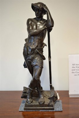 Lot 518 - Bronze figure of a farm worker standing with a sickle, stamped Eugene Marioton with foundry...