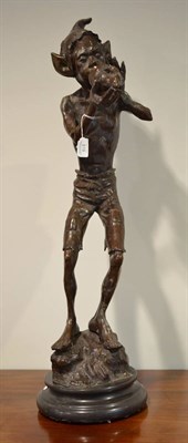 Lot 519 - A bronzed figure of an elf, 63cm high