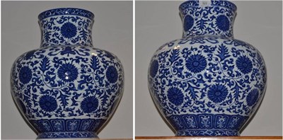 Lot 522 - A pair of Chinese blue and white vases of recent date, 43cm high