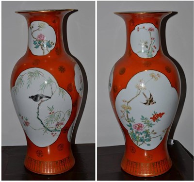 Lot 527 - A pair of Oriental orange ground vases of recent date, 47cm high