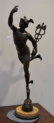 Lot 530 - A bronze figure of a Classical male, raised on a circular marble base, 51cm high