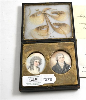 Lot 545 - A pair of George III oval miniatures on ivory, Sir Alexander (founder of Hong Kong) and Lady...