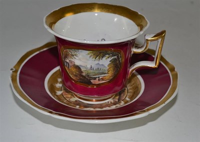 Lot 549 - A Rockingham porcelain pictorial cup and saucer with red Griffin backstamp, a painted number...