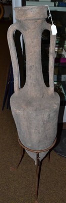 Lot 564 - Roman amphora on stand, 94cm high (excluding stand)