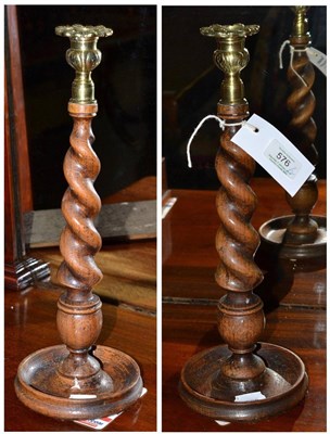 Lot 576 - Pair oak barley twist candlesticks