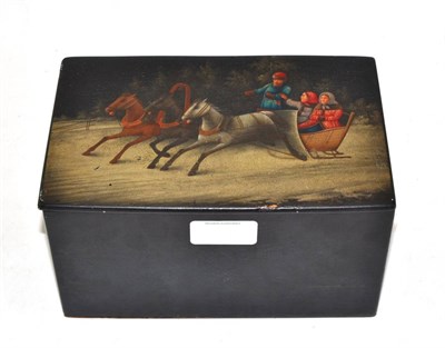 Lot 577 - A 19th century Russian lacquer tea caddy, the hinged cover painted with a troika in a winter...